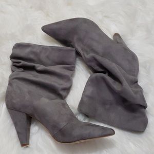 Carlos Santana sues slouchy boots